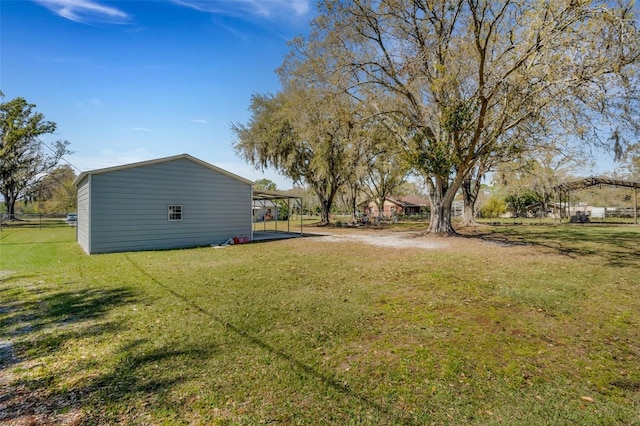 view of yard featuring a carport