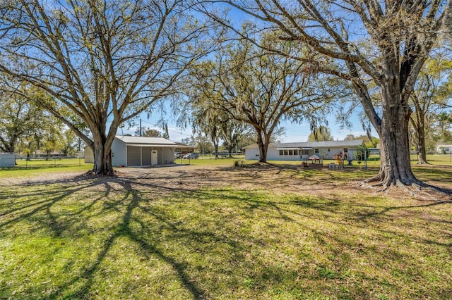 view of yard with fence