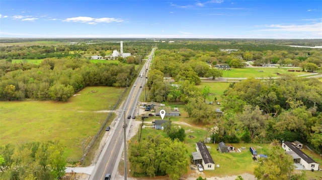 bird's eye view with a forest view