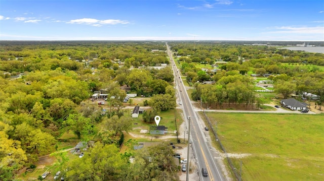 aerial view with a wooded view