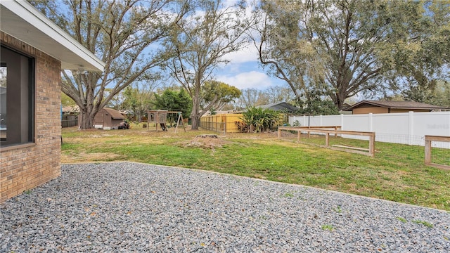 view of yard with a fenced backyard and a patio