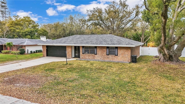 ranch-style house featuring a garage, brick siding, concrete driveway, fence, and a front yard