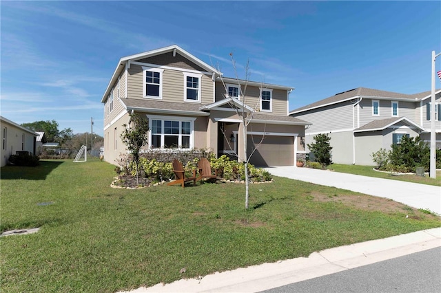 view of front of property with concrete driveway, an attached garage, and a front yard