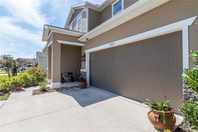 garage with driveway