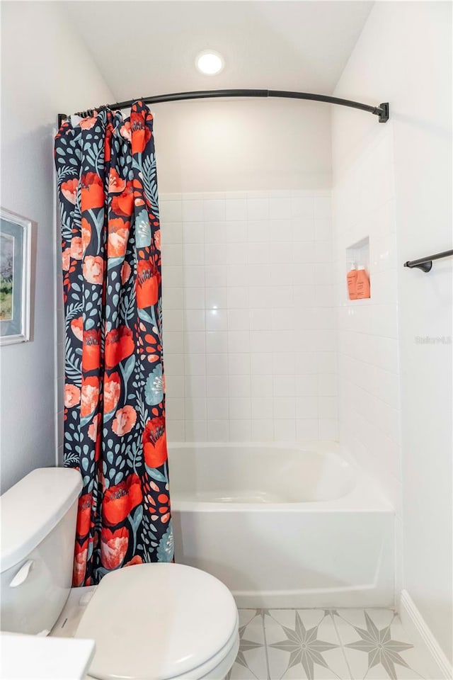 bathroom with recessed lighting, shower / bath combo with shower curtain, toilet, and tile patterned floors