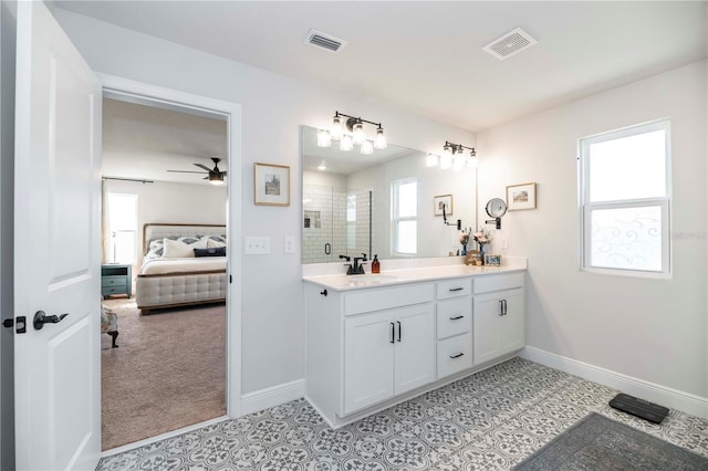 full bath featuring a shower stall, visible vents, connected bathroom, and vanity