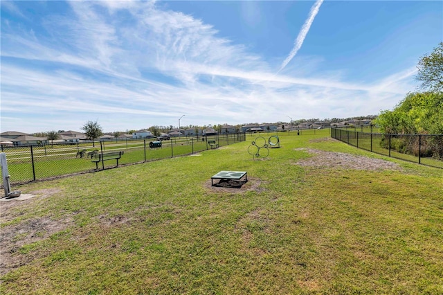 view of yard with fence