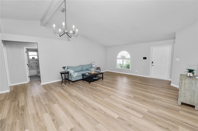 sitting room with light wood-type flooring, a notable chandelier, lofted ceiling with beams, and baseboards