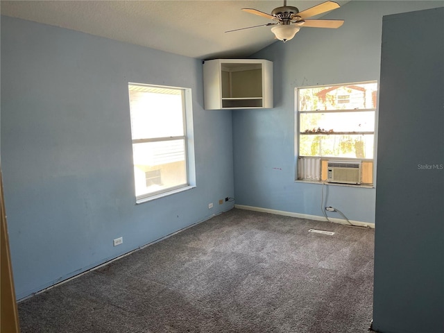 330 Callitris Ave, Polk City, FL 33868 - carpeted spare room with visible vents, a ceiling fan, vaulted ceiling, and cooling unit