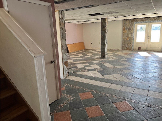 330 Callitris Ave, Polk City, FL 33868 - basement with a paneled ceiling and french doors