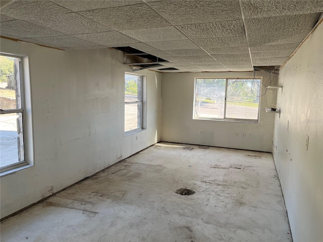 330 Callitris Ave, Polk City, FL 33868 - spare room with a healthy amount of sunlight and a drop ceiling
