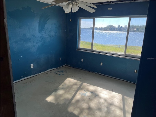 330 Callitris Ave, Polk City, FL 33868 - unfurnished room with ceiling fan and a water view