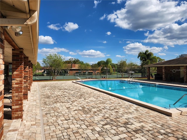 pool featuring fence