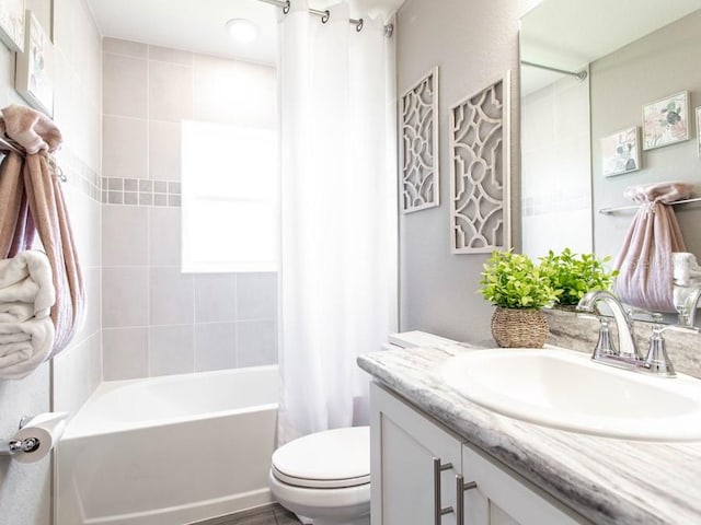 full bathroom with vanity, toilet, and shower / bathtub combination with curtain