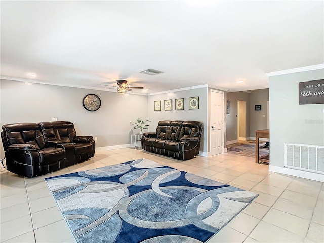 living room with baseboards, visible vents, ornamental molding, and light tile patterned flooring