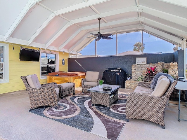 view of patio featuring outdoor lounge area, a hot tub, ceiling fan, and area for grilling