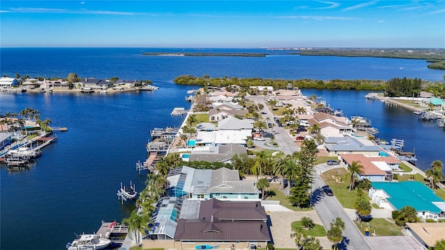 bird's eye view with a water view and a residential view