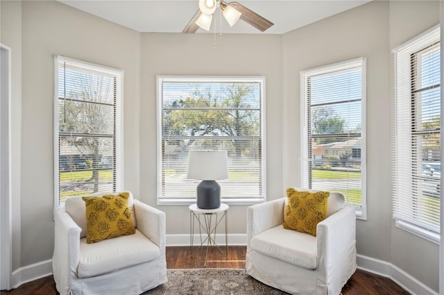 sunroom with a ceiling fan