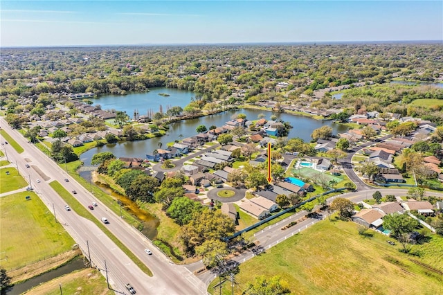 aerial view with a water view and a residential view