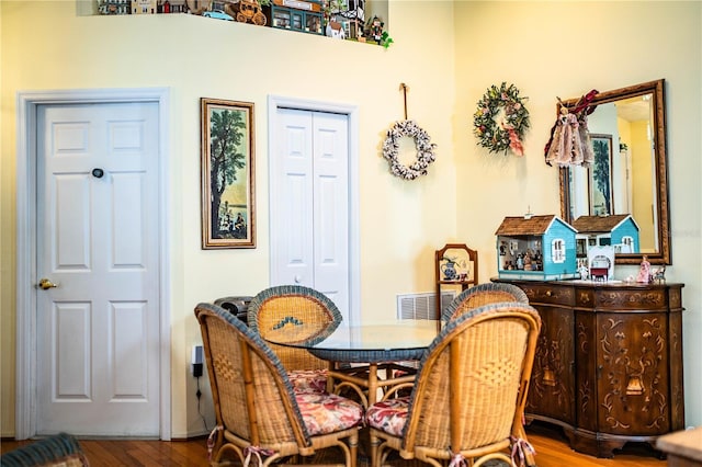 dining area with wood finished floors