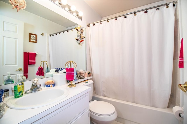 bathroom featuring toilet, shower / bath combination with curtain, and vanity