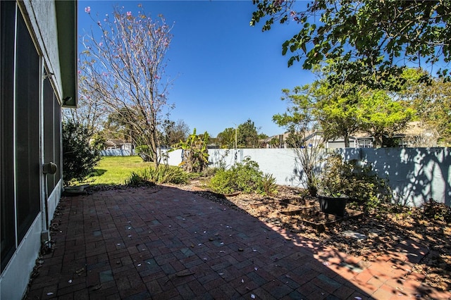 view of patio featuring a fenced backyard