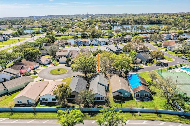 aerial view featuring a residential view and a water view