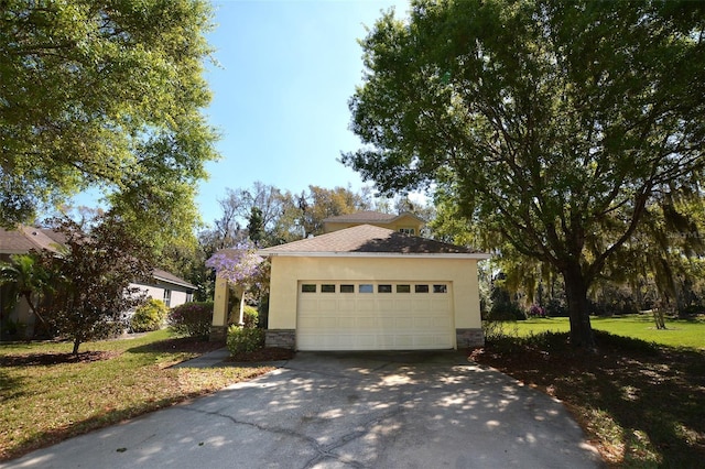 garage featuring driveway