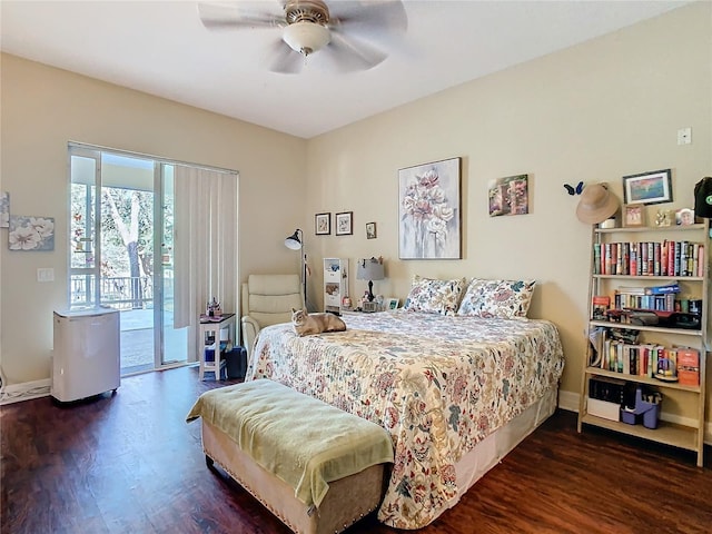 11175 Hyde St, Weeki Wachee, FL 34614 - bedroom featuring access to outside, wood finished floors, baseboards, and a ceiling fan
