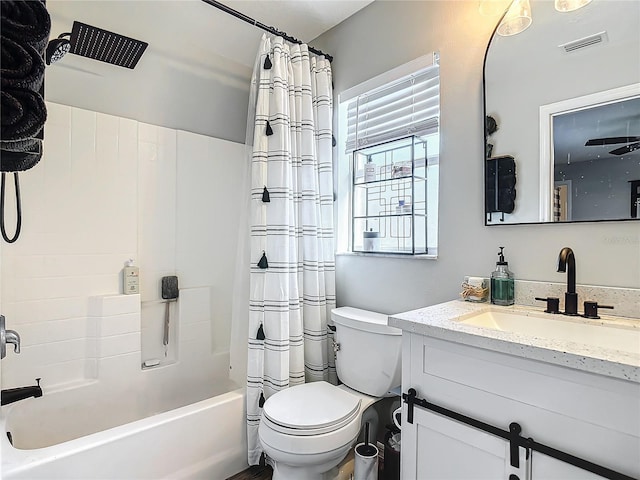 full bath featuring visible vents, toilet, vanity, and shower / bath combo