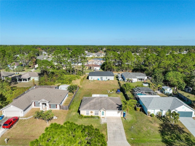 birds eye view of property with a residential view