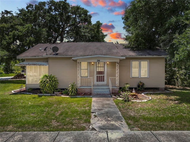 view of front of house with a front lawn