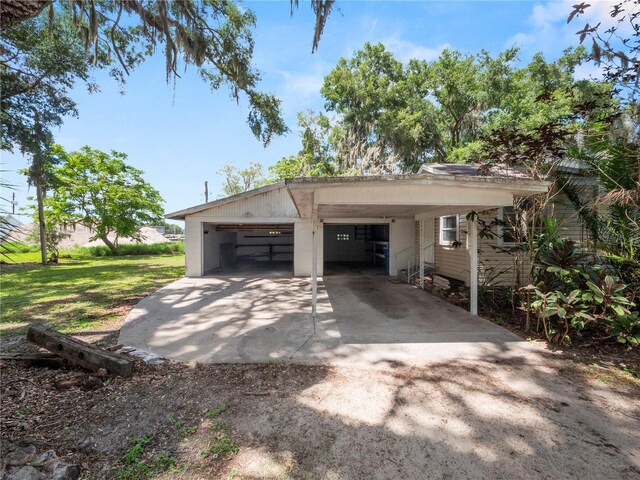 exterior space with a detached garage