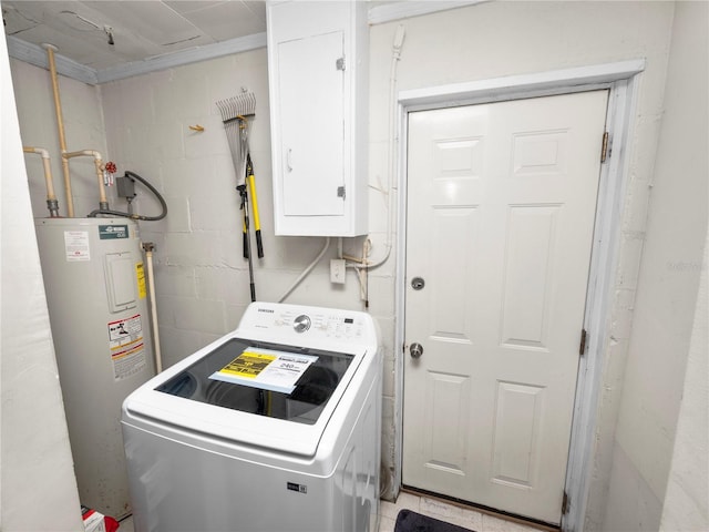 clothes washing area with concrete block wall, laundry area, electric panel, washer / clothes dryer, and electric water heater