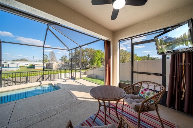 exterior space with ceiling fan