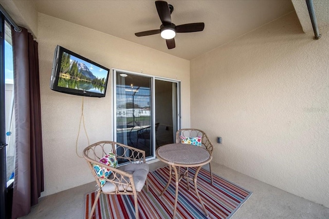 view of patio featuring a ceiling fan