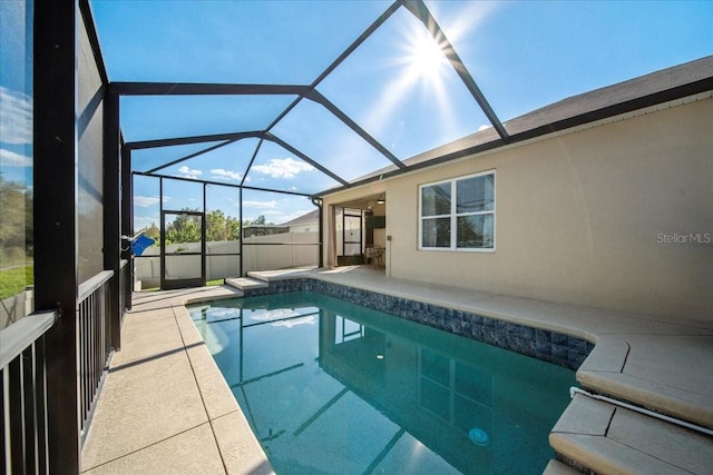 view of pool featuring a fenced in pool, a lanai, a patio area, and fence