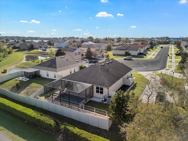 birds eye view of property with a residential view