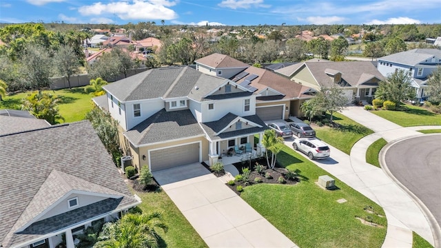 drone / aerial view with a residential view