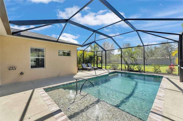 outdoor pool with a patio and a lanai