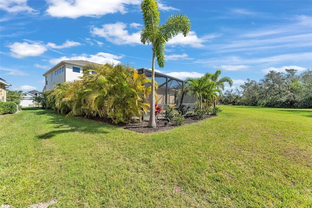 view of yard featuring a lanai