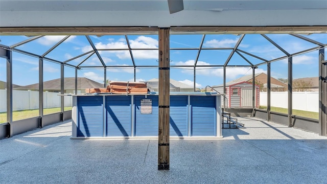 view of pool featuring a patio area, a lanai, and fence