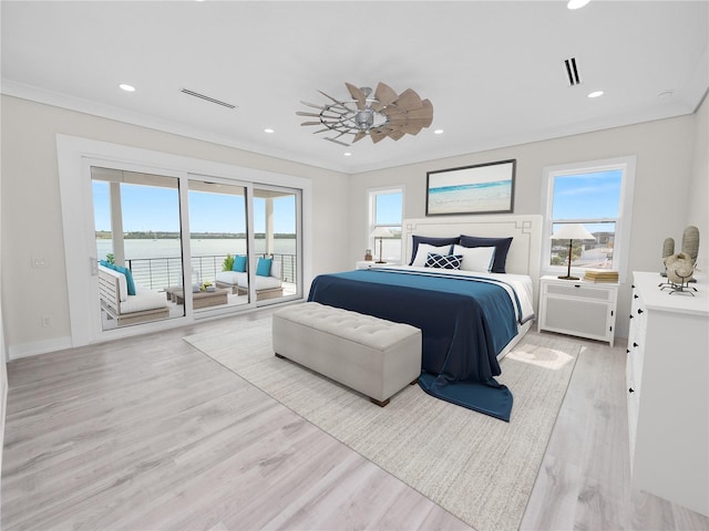 bedroom featuring light wood-style floors, access to outside, ornamental molding, and recessed lighting