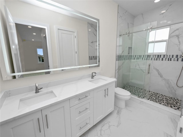 bathroom featuring toilet, marble finish floor, a sink, and a marble finish shower