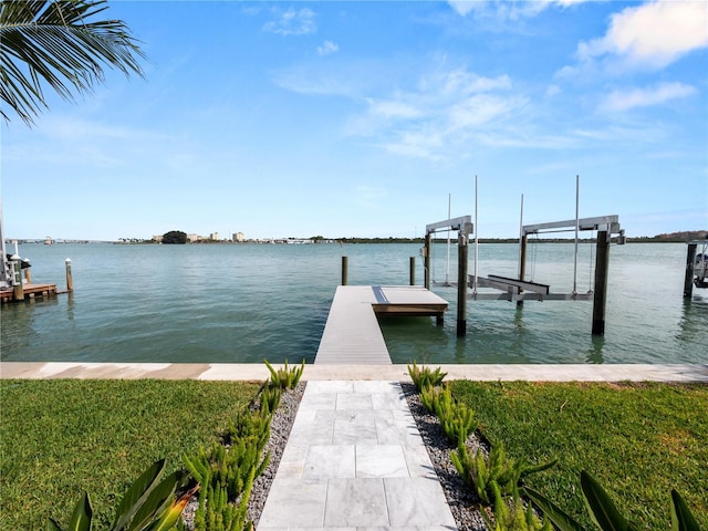 view of dock featuring a water view and boat lift
