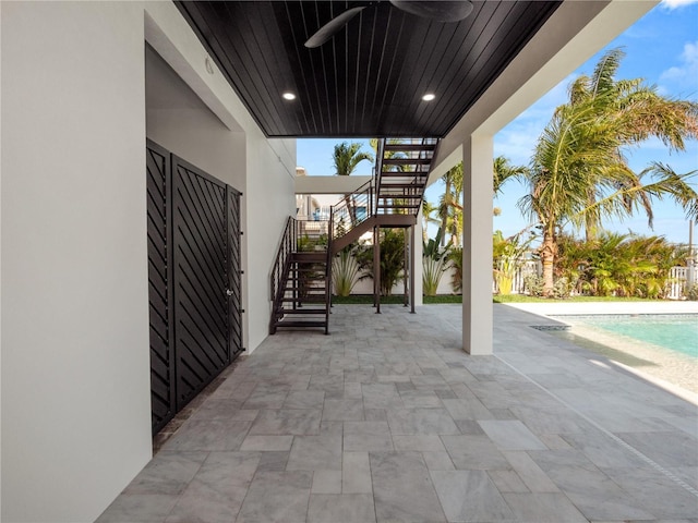 view of patio with stairway