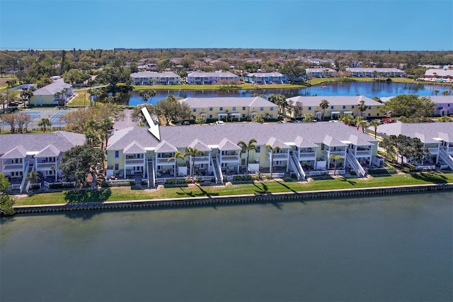 aerial view featuring a residential view and a water view