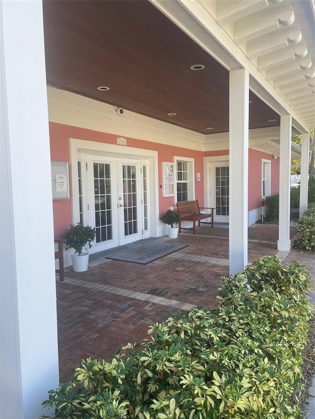 view of patio featuring french doors and covered porch