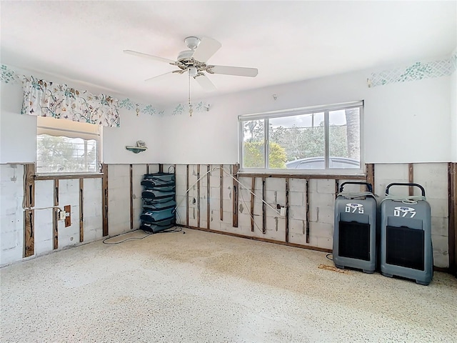 spare room with a ceiling fan