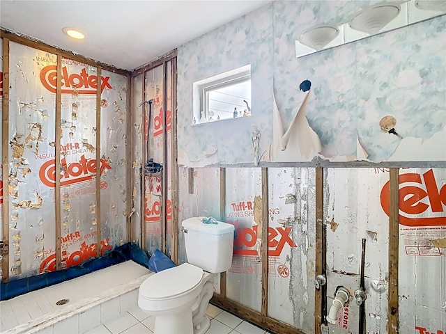 bathroom with recessed lighting, toilet, and tile patterned flooring